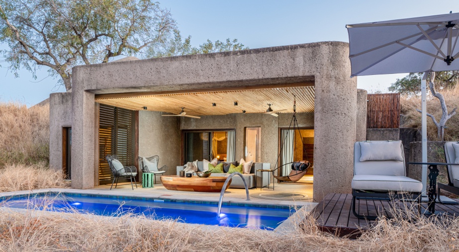 Let Sabi Sabi Earth Lodge captivate with its grand luxury suites, blending architecture and nature. Let Sabi Sabi Earth Lodge captivate with its grand luxury suites, blending architecture and nature.